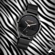 Fastrack Animal Print Quartz Analog with Date Black Dial Stainless Steel Strap Watch for Girls - image number 0