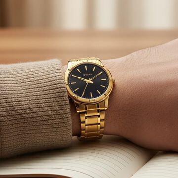 Titan Karishma Quartz Analog Black Dial Golden Stainless Steel Strap Watch For Men