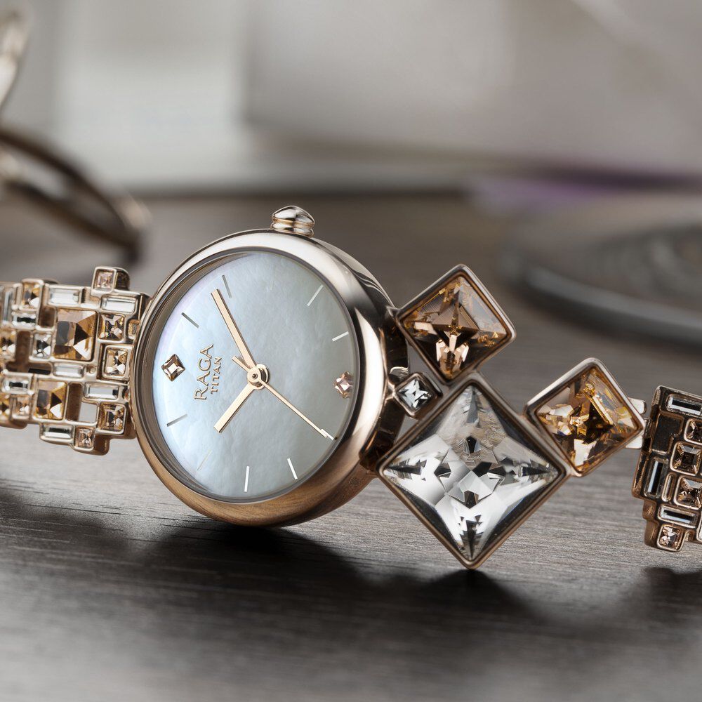 Buy Online Titan Raga Cocktails Mother of Pearl Dial Women Watch With Metal Strap nq95106wm01f Titan