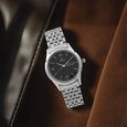 Titan Karishma Black Dial Analog with Day and Date Stainless Steel Strap watch for Men - image number 0