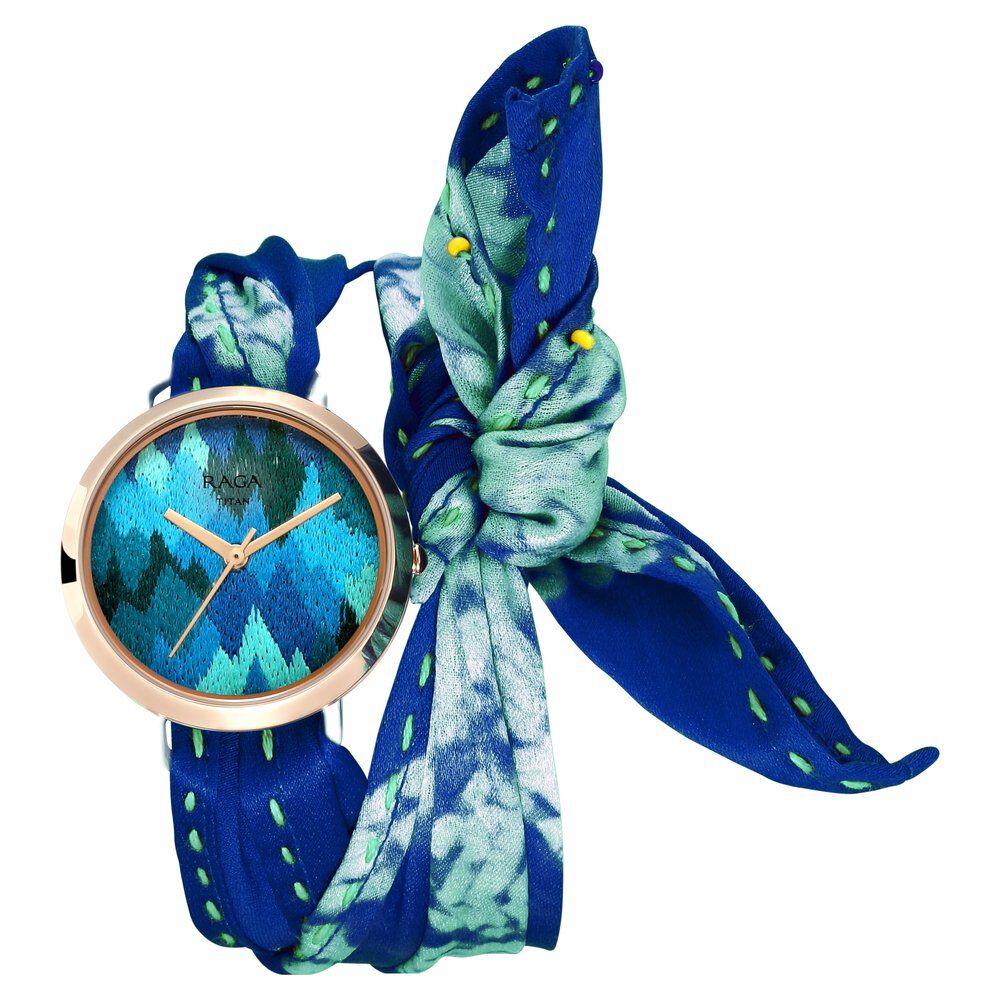 Buy Online Titan Raga Twirl Blue Dial Analog Silk Fabric and Dori Strap watch for Women 95080wf02 Titan