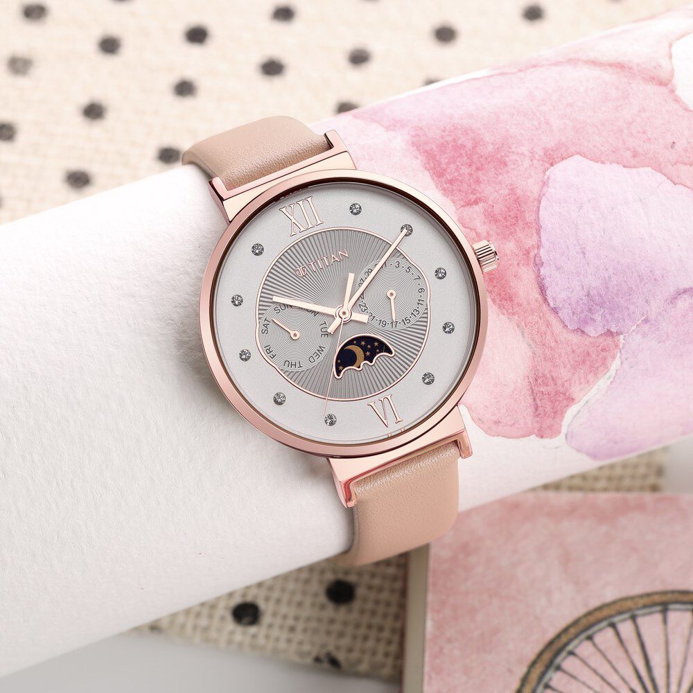Buy Online Titan Slimline Silver Dial Quartz Multifunction Leather Strap watch for Women ns95144wl01 Titan