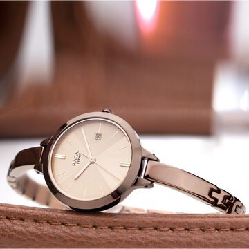 Titan Quartz Analog with Date Rose Gold Dial Brown Metal Strap Watch For Women