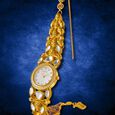 Titan Nebula Nazakat Quartz Analog 22 Karat Solid Gold Watch for Women