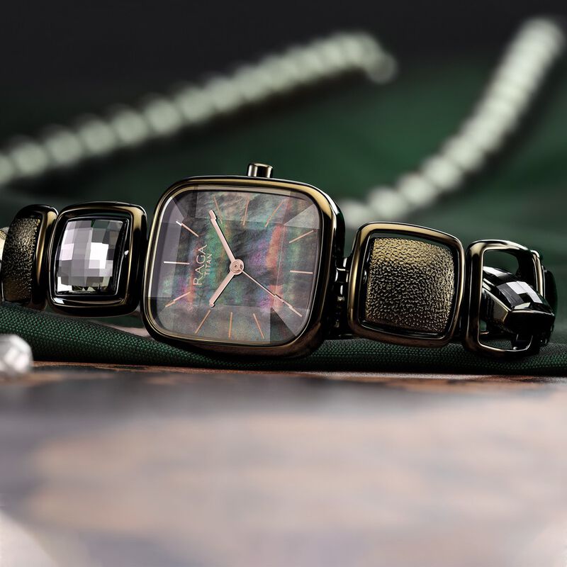 Titan Raga Moments Of Joy Quartz Analog Mother of Pearl Dial Green Metal Strap Watch For Women