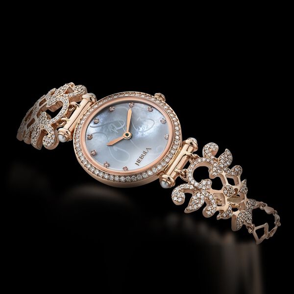 Titan Nebula Calligraphy Quartz Analog 18 Karat Solid Gold Watch for Women - image number 0