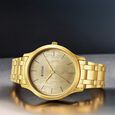 Titan Karishma Quartz Analog Champagne Round Dial Golden Stainless Steel Strap Watch For Men - image number 0