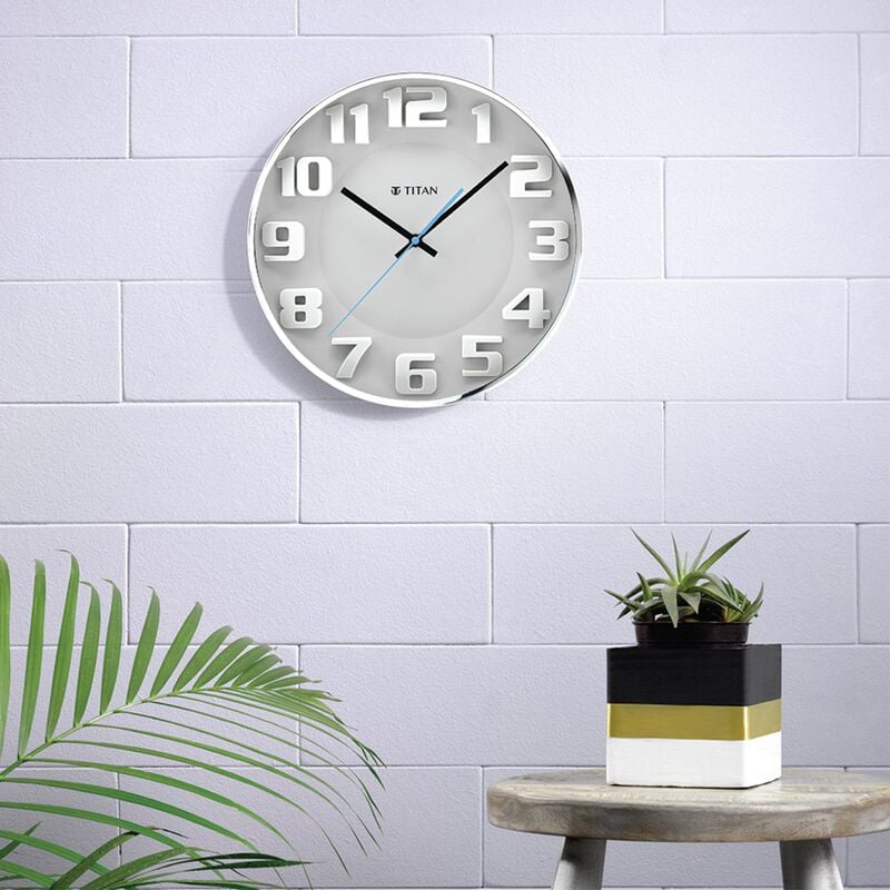 Buy Online Titan Metallic Wall Clock Moulded Dial with solid numbers