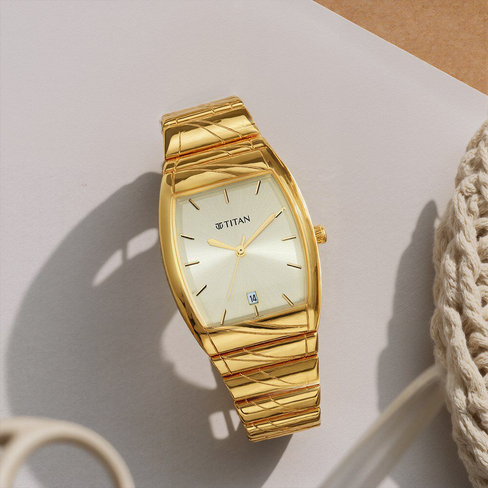 Buy Online Titan Karishma Quartz Analog with Date Champagne Dial