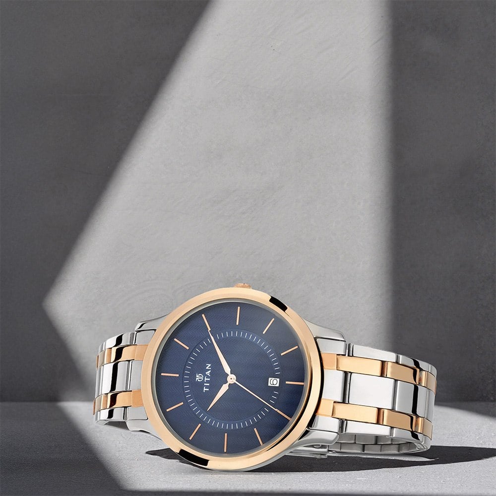 Titan Karishma blue dial two-tone men's watch (NT1825KM01) at ₹2,796